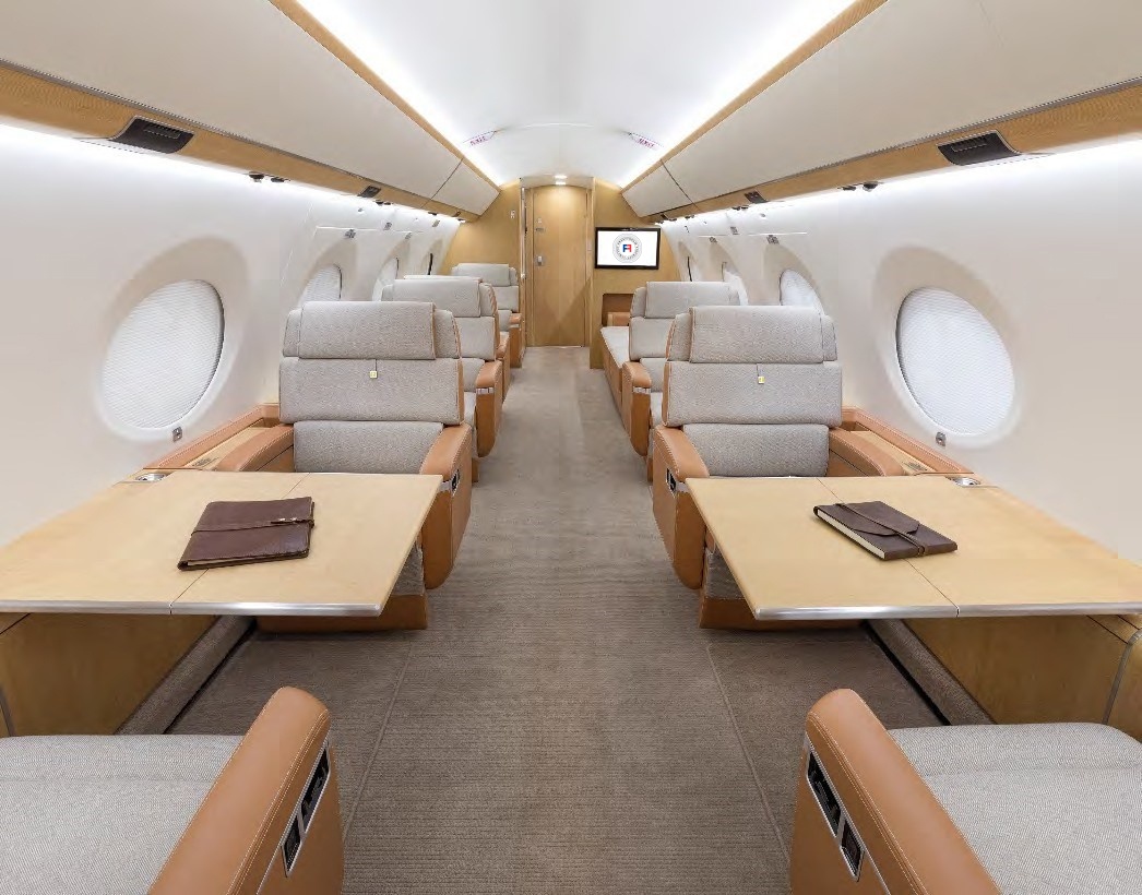 Luxurious seating and tables in cabin of the 2018 Gulfstream G650 S/N 6312 jet on Freestream