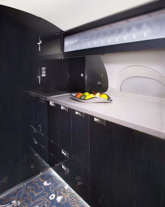 Jet countertop with fruits laid in a bowl