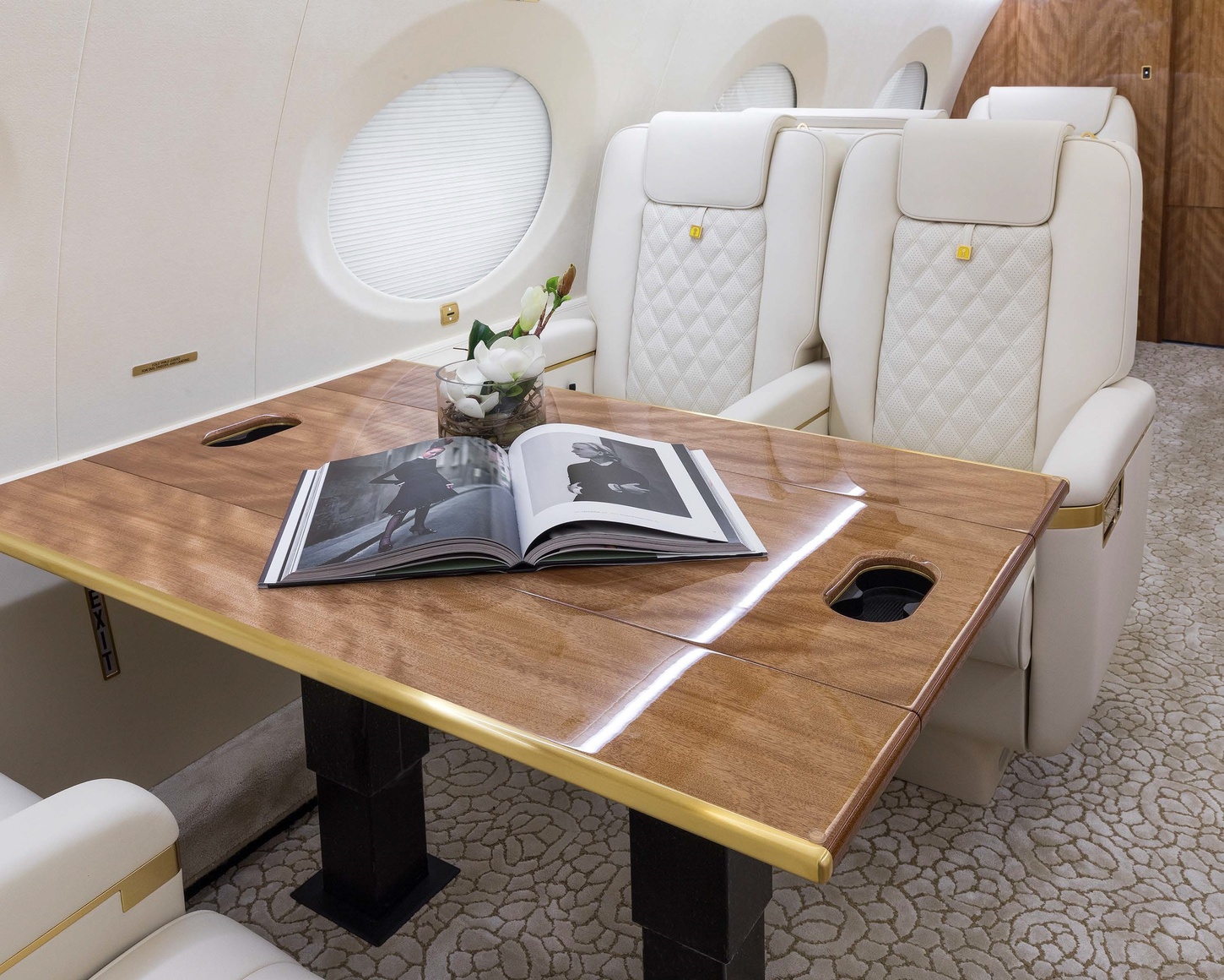 Open book on the table of a 2018 Gulfstream G650ER jet on Freestream